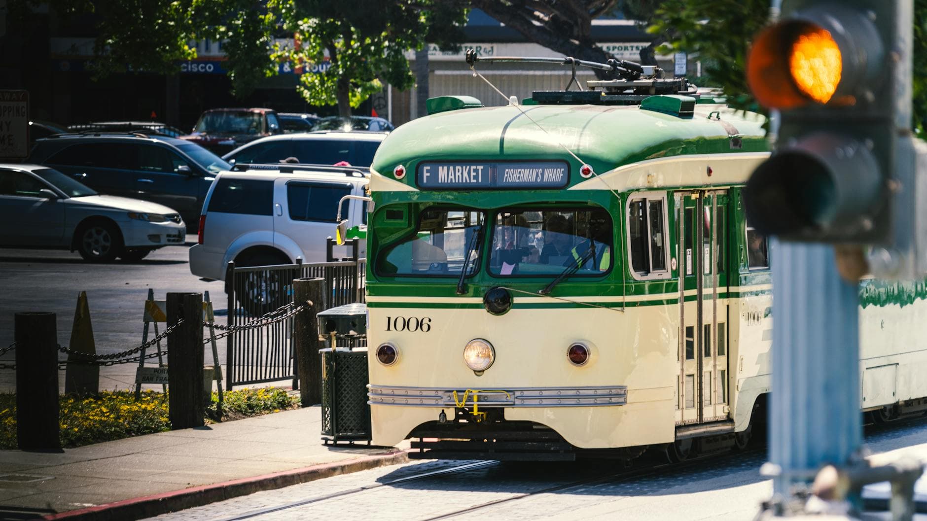 Iconic F Market streetcar at Fisherman's Wharf in San Francisco, captured on a sunny day.